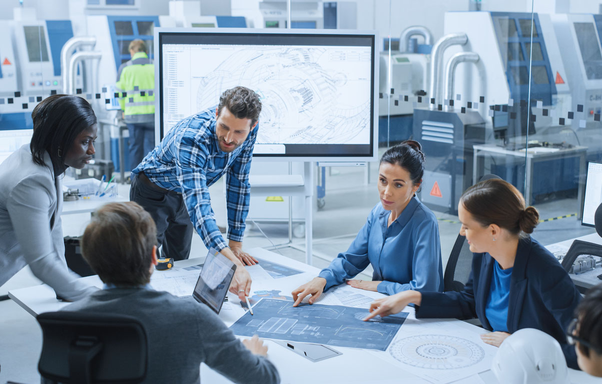 Modern Factory Office Meeting Room: Busy Diverse Team of Engineers, Managers and Investors Talking at Conference Table, Use Interactive TV, Analyze, Find Solutions, Debate and Discuss Engine Concept